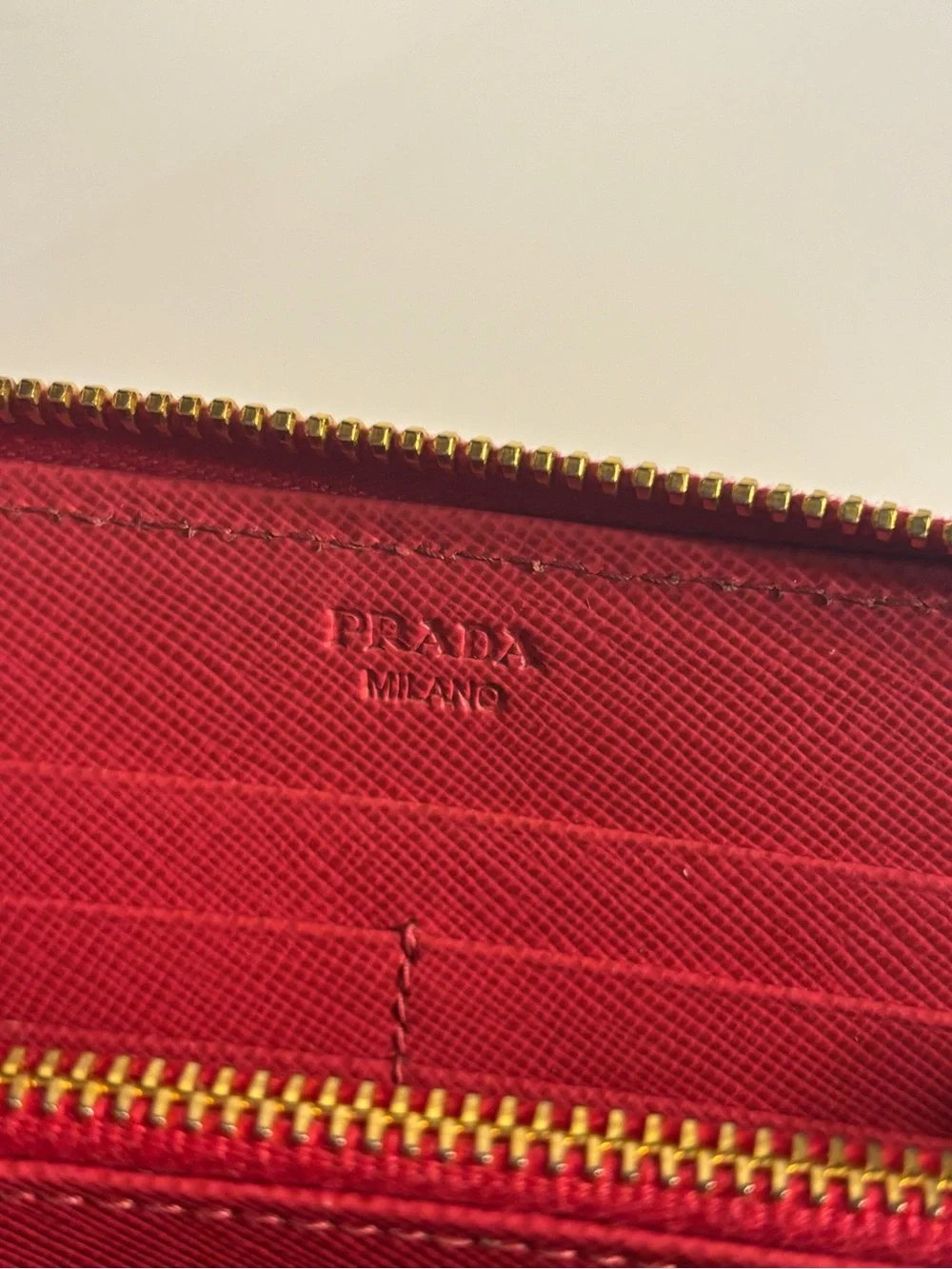 Prada reddish pink Saffiano Zip-Around Wallet with Bow Detail
